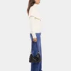 Black Paco shoulder clutch in calfkin leather