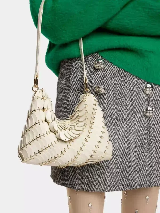 Cream Paco shoulder clutch in calfskin leather