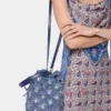 Denim blue raffia bucket bag