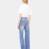 Flared jeans embellished with 1969 discs