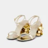Gold sandals with Sparkle disc heels