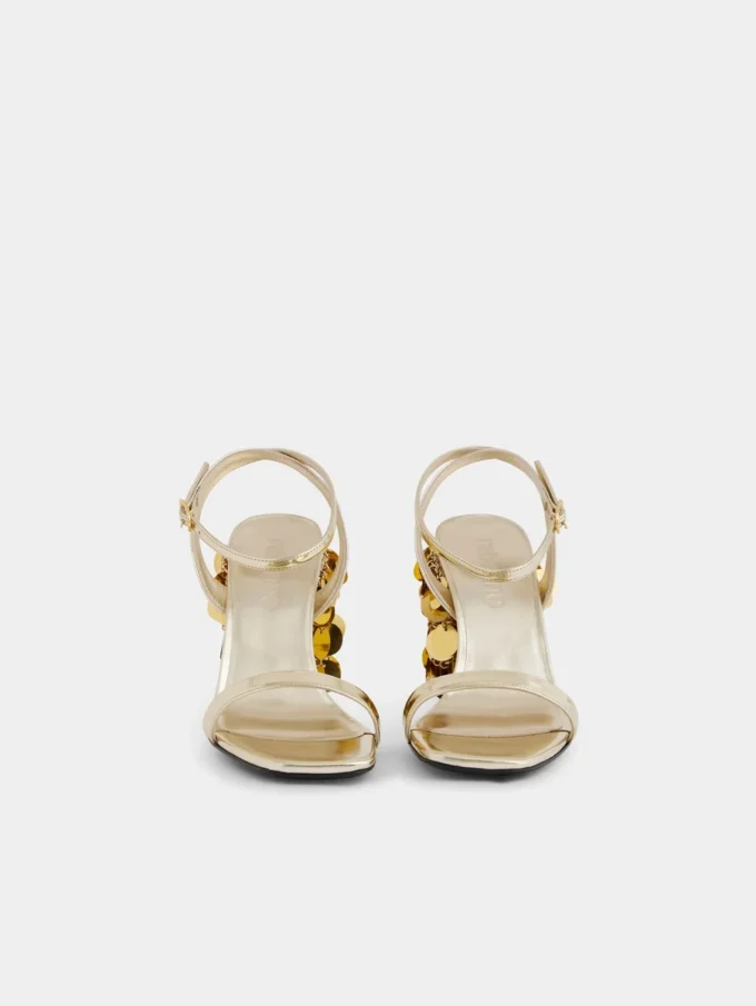 Gold sandals with Sparkle disc heels