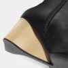 Golden heel knee-high leather Boots