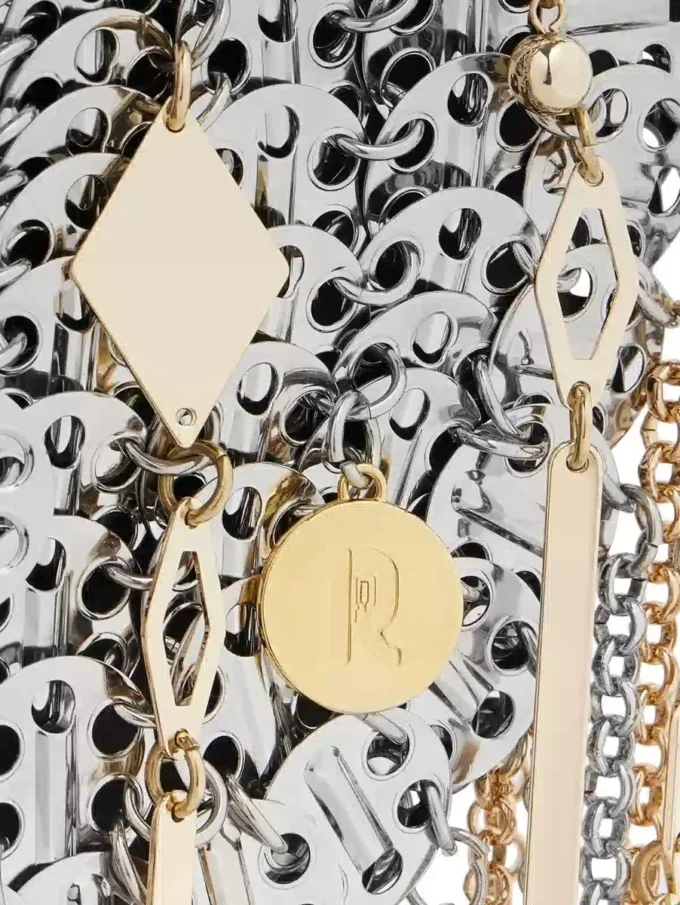 Iconic silver 1969 moon bag assembled with metallic pampilles