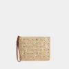 Pouch in raffia