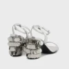 Silver sandals with Sparkle disc heels