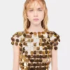The iconic gold Sparkle disc dress