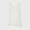 White tank top with signature piercing